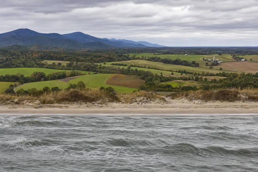 Panoramic collage of North Carolina: Blue Ridge mountains, Piedmont farmland and Outer Banks beach